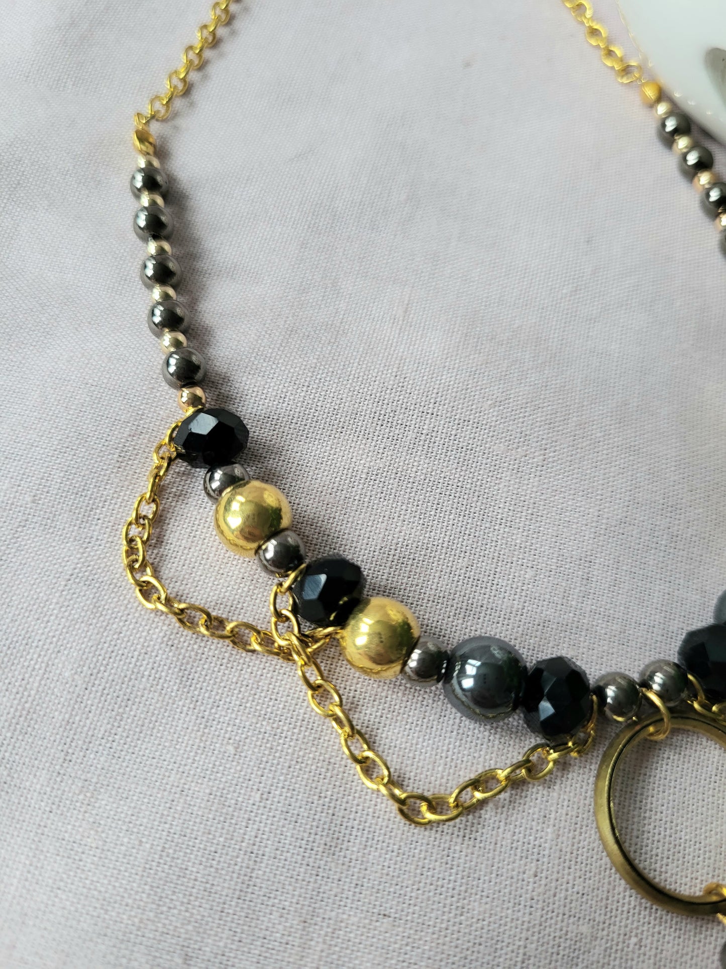 Black and Gold Upcycled Beaded Bib Necklace with Double Ring Drop Pendant and Chain Detail