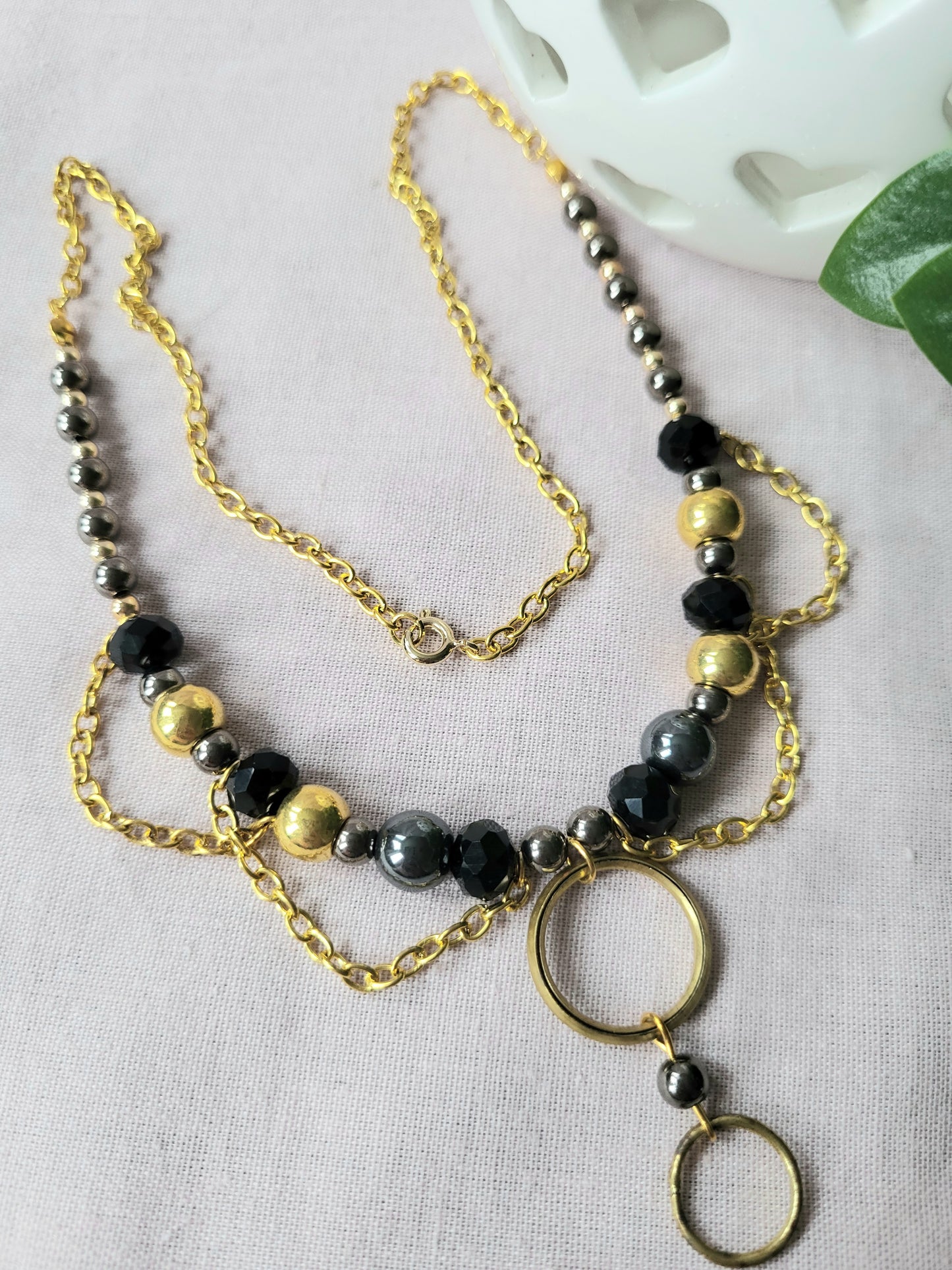Black and Gold Upcycled Beaded Bib Necklace with Double Ring Drop Pendant and Chain Detail