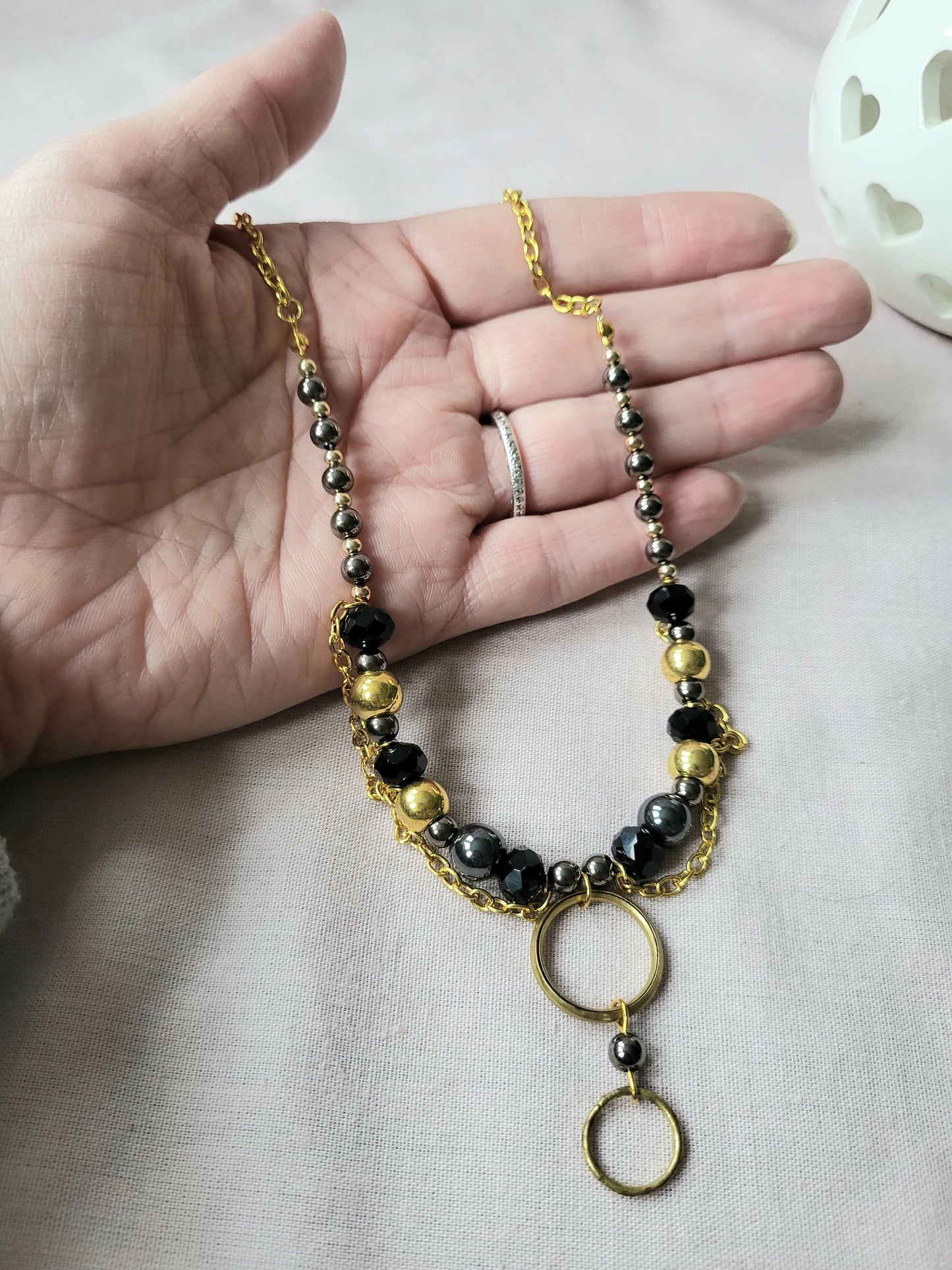 Black and Gold Upcycled Beaded Bib Necklace with Double Ring Drop Pendant and Chain Detail