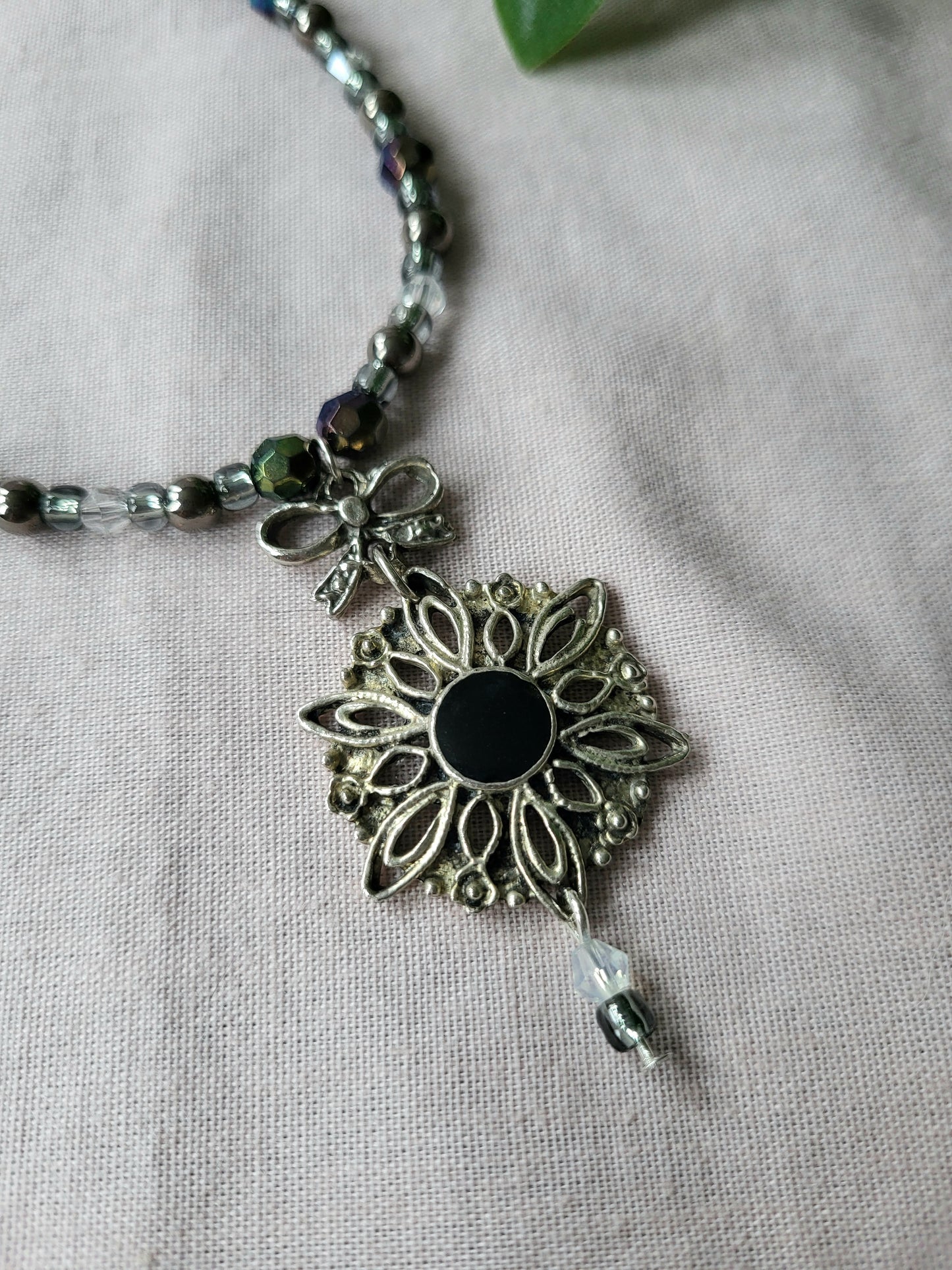 Black and Silver Upcycled Beaded Bib Necklace with Bow Detail