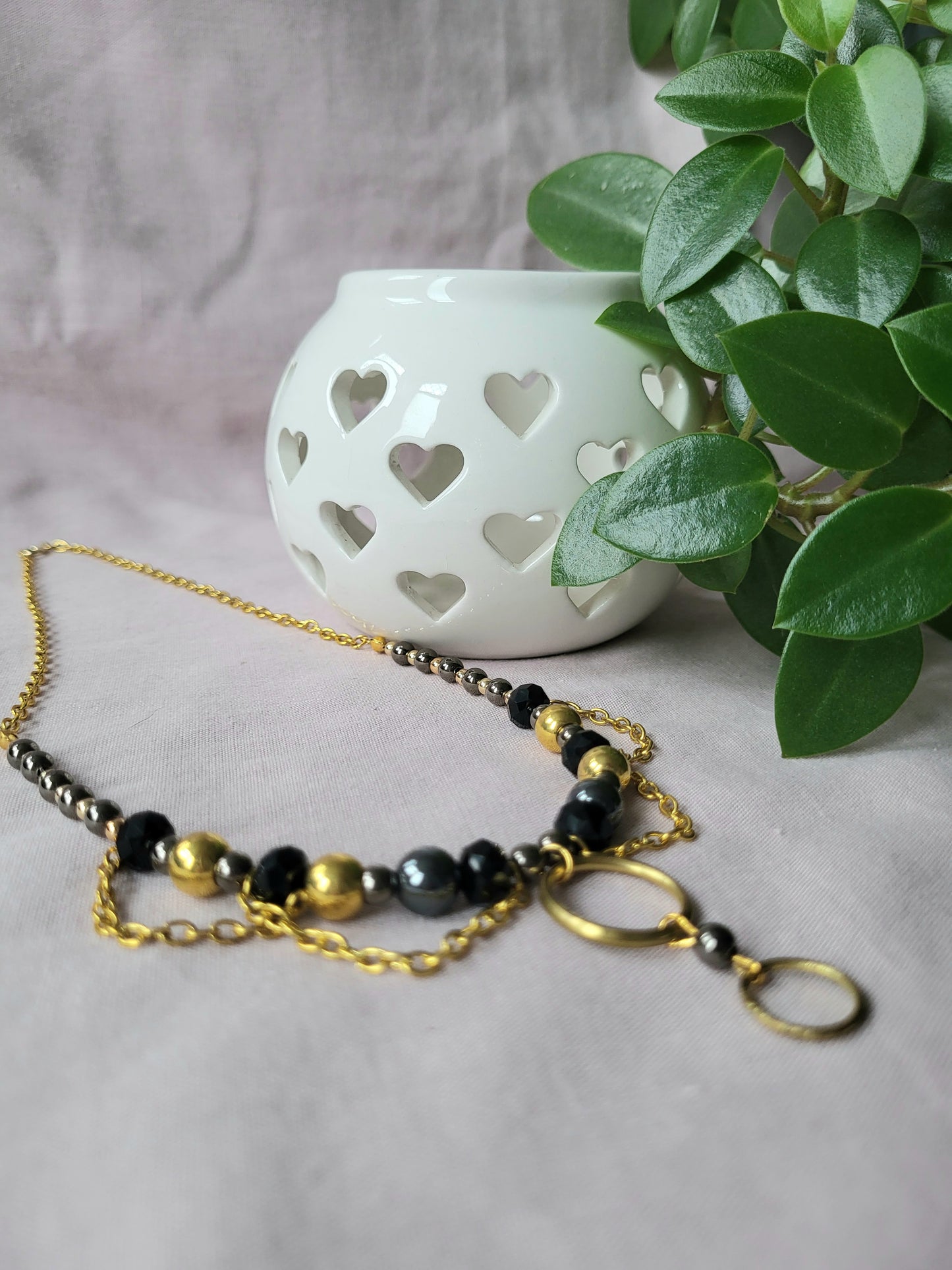 Black and Gold Upcycled Beaded Bib Necklace with Double Ring Drop Pendant and Chain Detail