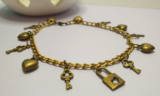 Key To My Heart Charm Bracelet with Hearts, Keys and a Padlock in Bronze