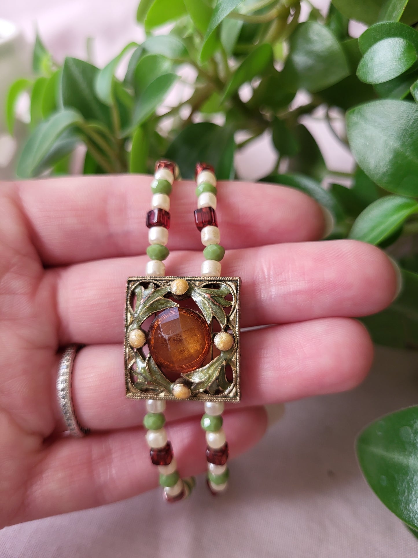 Upcycled Green, Ivory and Dark Red Beaded Bracelet with Ornate Pendant