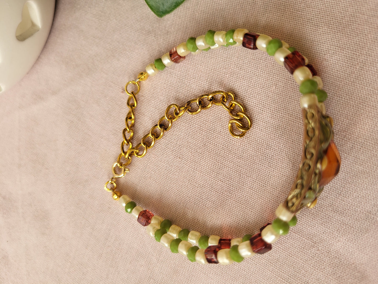 Upcycled Green, Ivory and Dark Red Beaded Bracelet with Ornate Pendant