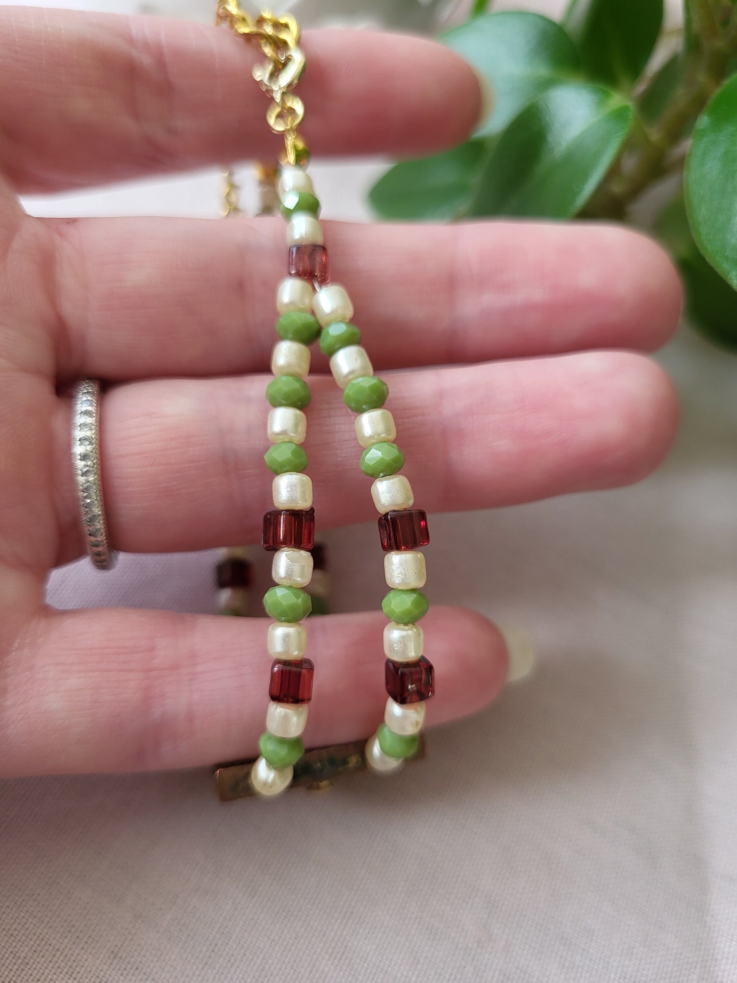 Upcycled Green, Ivory and Dark Red Beaded Bracelet with Ornate Pendant